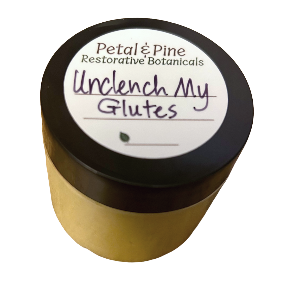 Gold ingredients with black lid labeled 'Unclench My Glutes' by Petal & Pine on a white background