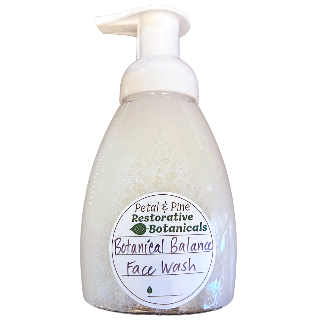 Foam face wash bottle with pump and 'Petal & Pine' label on a white background