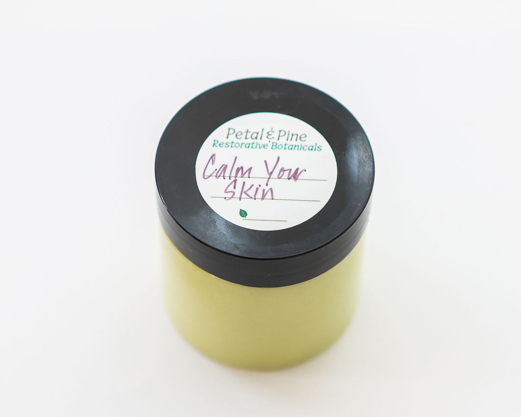 Jar of 'Calm Your Skin' product by Petal & Pine on a white background