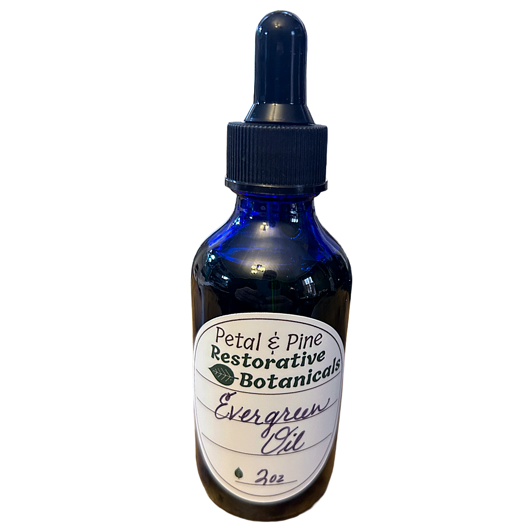 Blue glass bottle with dropper labeled 'Petal & Pine Restorative Botanicals' on a white background