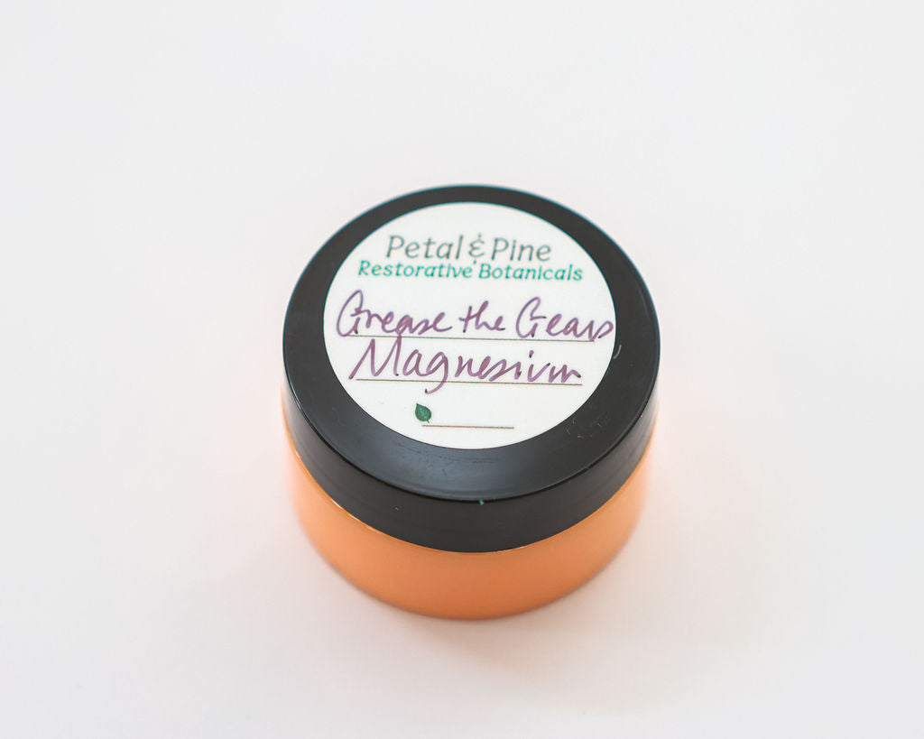Jar of 'Grease the Gear Magnesium' by Petal & Pine on a white background