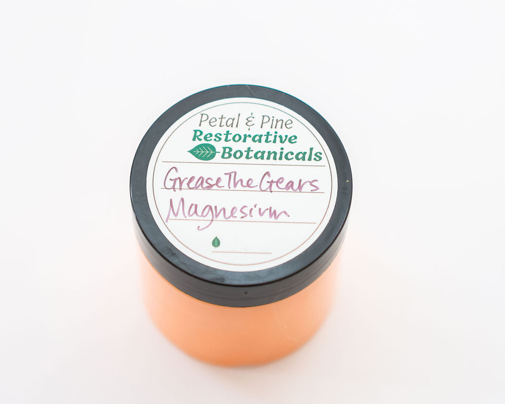 Jar of 'Grease The Gears Magnesium' by Petal & Pine on a white background
