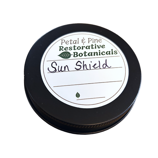 Jar of 'Sun Shield' by Petal & Pine Restorative Botanicals on a white background