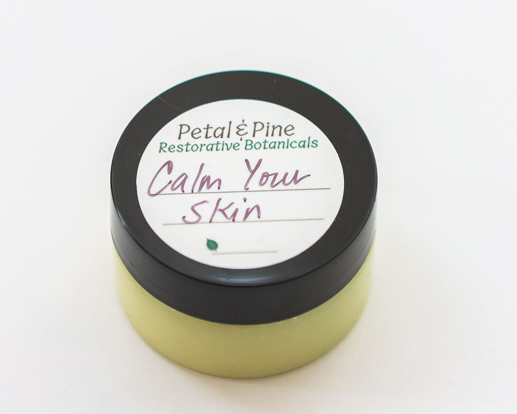 1 oz Jar of 'Petal & Pine' product with a label on a white background