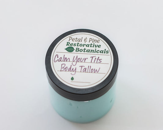 Jar of 'Calm Your Tits Body Tallow' by Petal & Pine on a white background