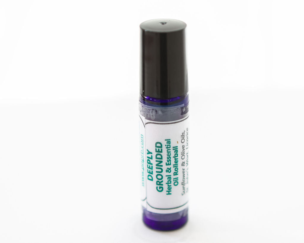 Roll-on bottle labeled 'Deeply Grounded' on a white background