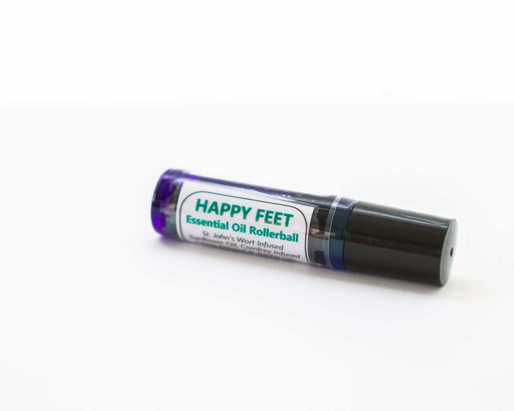 Happy Feet essential oil rollerball on a white background
