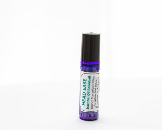Roll-on bottle labeled 'HEAD EASE' on a white background