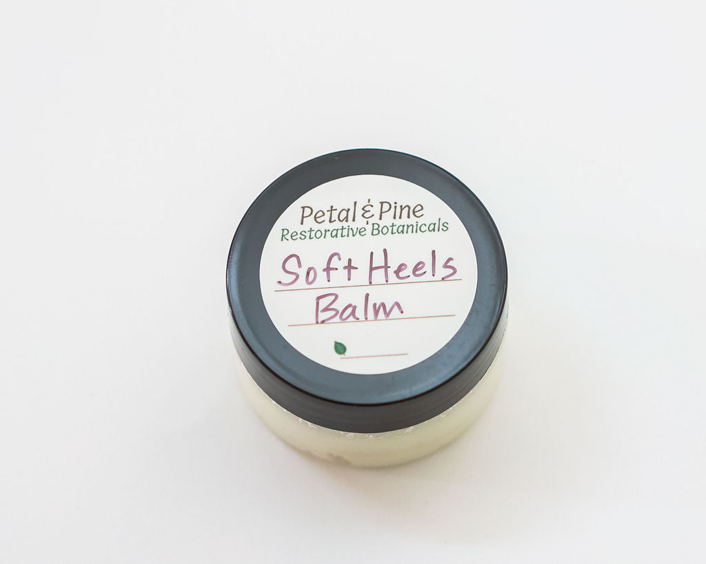 Jar of 'Soft Heels Balm' by Petal & Pine on a white background