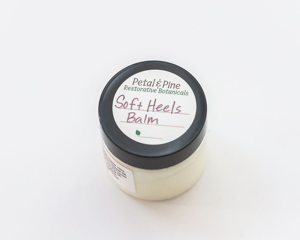 Jar of 'Soft Heels Balm' by Petal & Pine on a white background