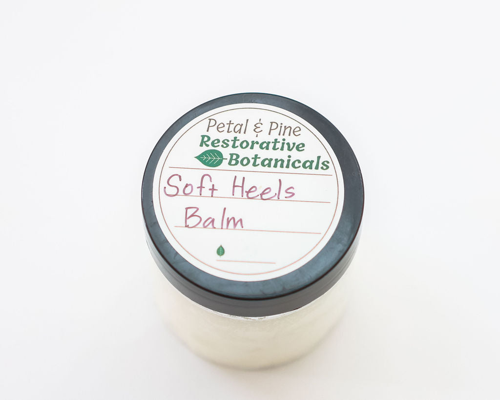 Jar of 'Soft Heels Balm' by Petal & Pine on a white background